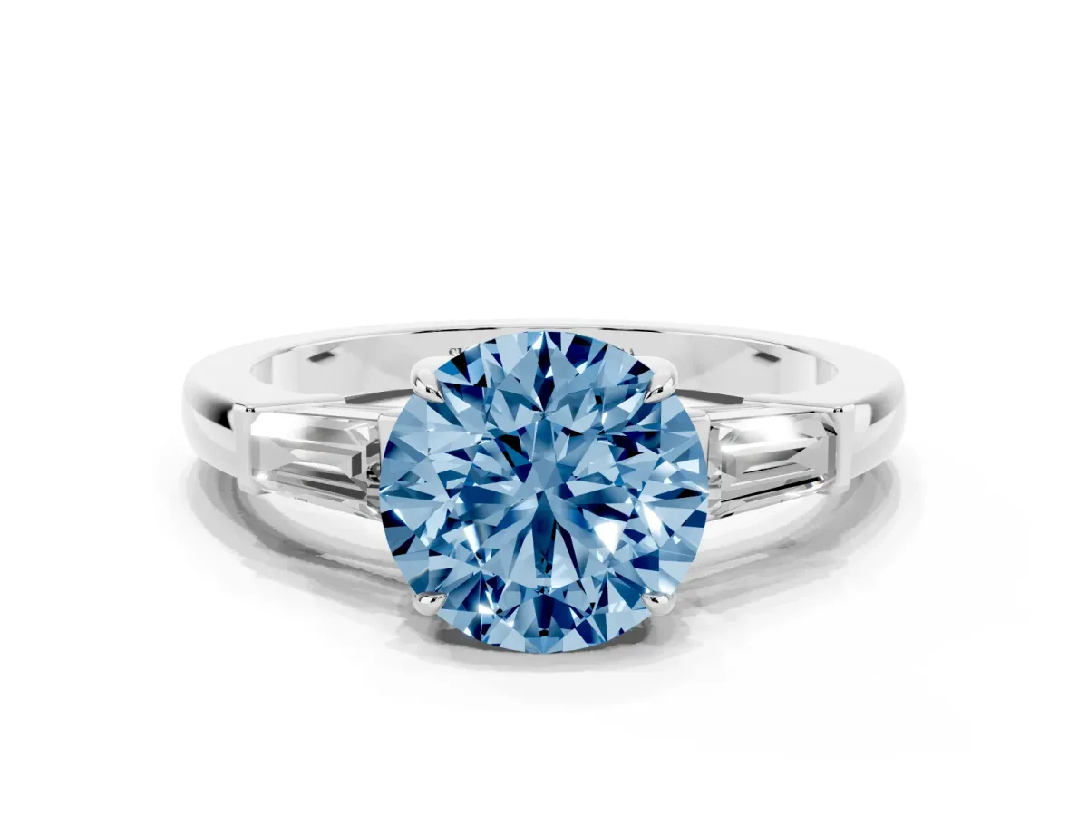 Fancy Blue Round Cut Diamond Three-Stone Ring with Tapered Baguette Side Stones and Prong Setting Silver