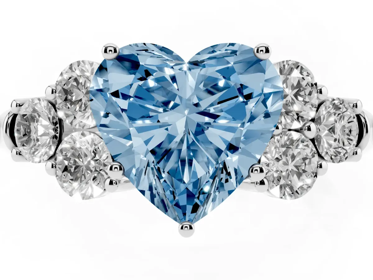 Fancy Blue Heart Cut Cut Diamond Cluster Ring with Round Accent Stones and Prong Setting on a Classic Band White gold