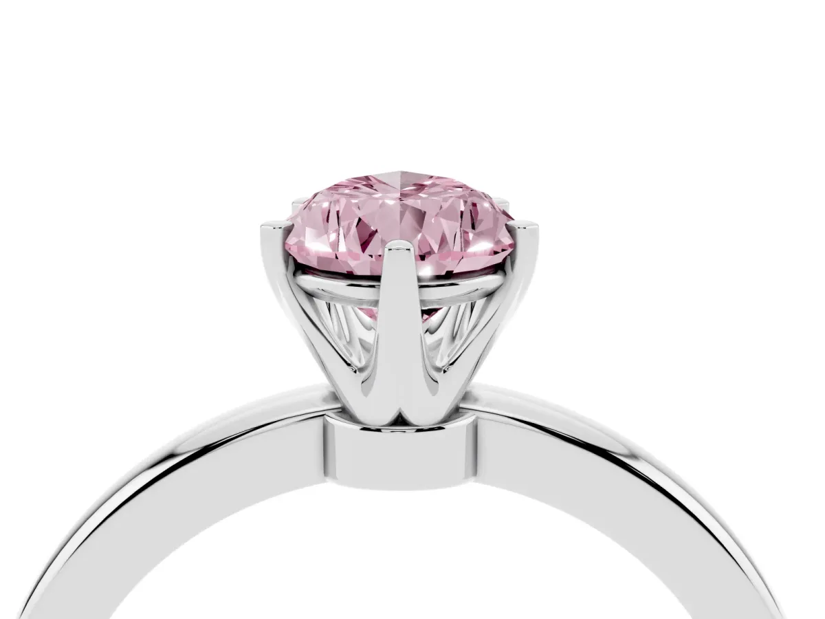 Fancy Pink Pear Cut Solitaire Diamond Ring with Six-Prong Setting on a Classic Band Silver