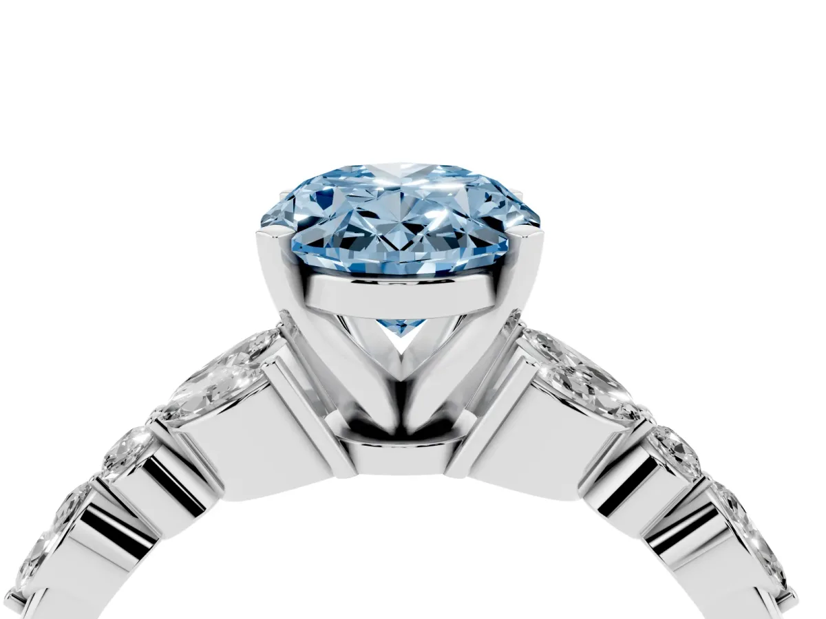 Fancy Blue Oval Cut Diamond Solitaire Ring with Side Stones and Four-Prong Setting Silver