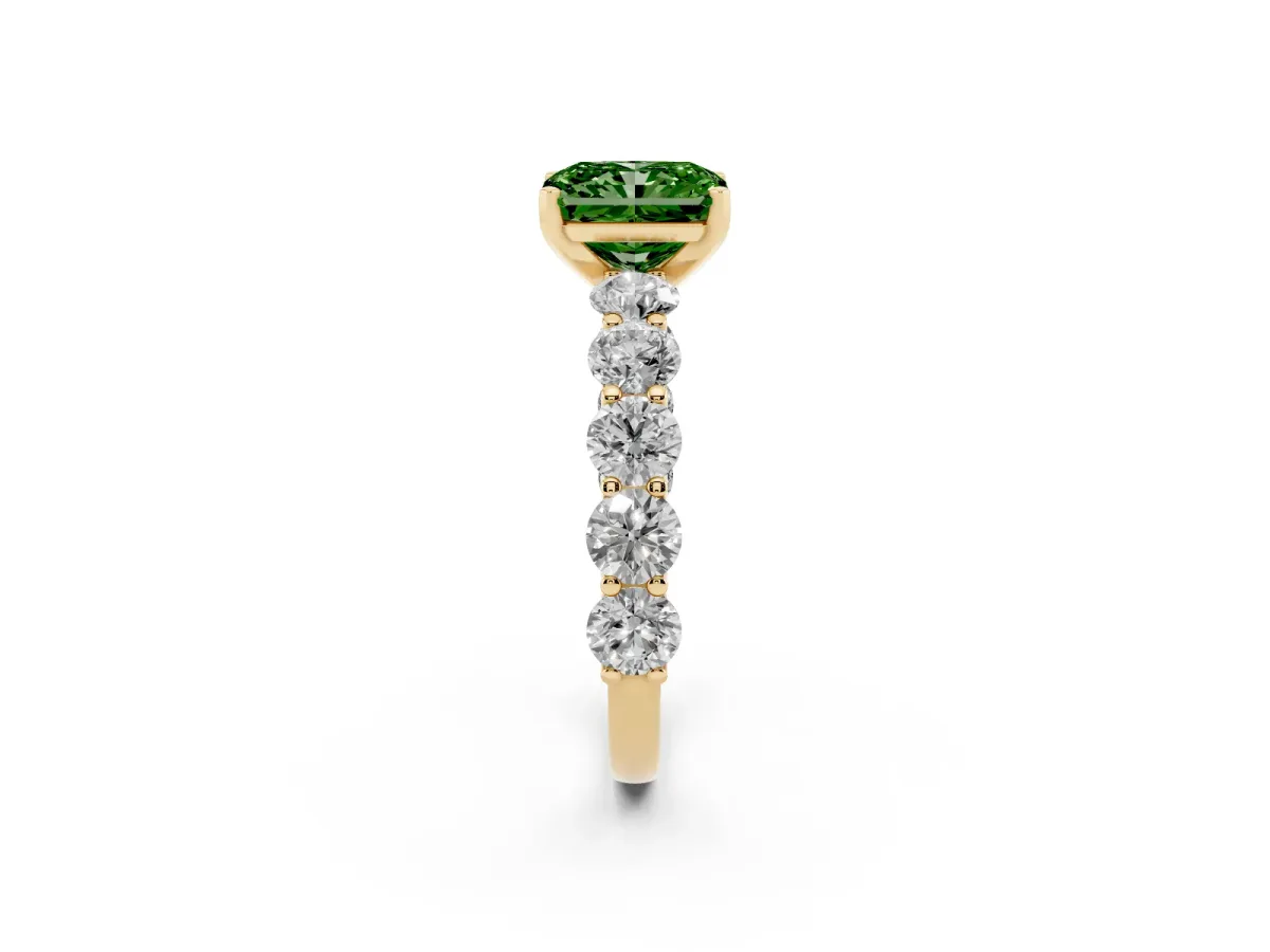 Fancy Green Radiant Cut Diamond Prong Setting with Side Stones on a Pave Band Yellow gold