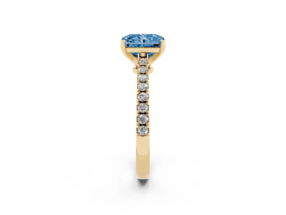 Fancy Blue Radiant Cut Cut Solitaire Diamond Engagement Ring with Pave Band and Four-Prong Setting Yellow gold