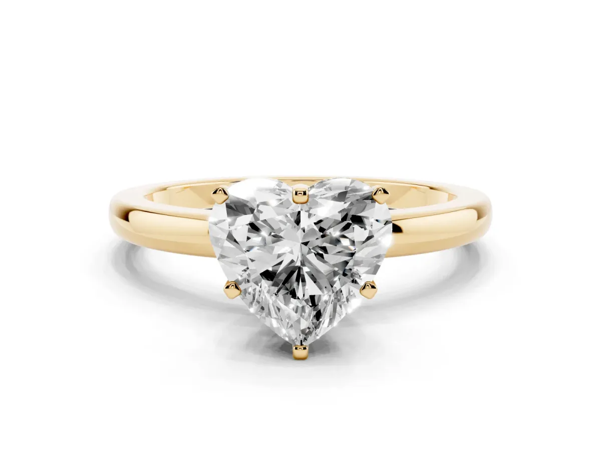 Heart Cut Solitaire Diamond Ring with Six-Prong Setting on a Classic Band Yellow gold