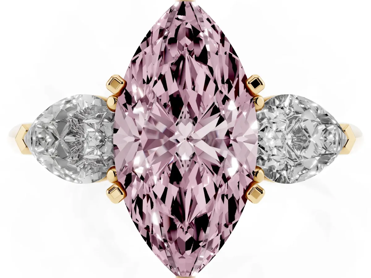 Fancy Pink Three-Stone Marquise Cut Diamond Ring with Pear Side Stones and Four-Prong Setting Yellow gold