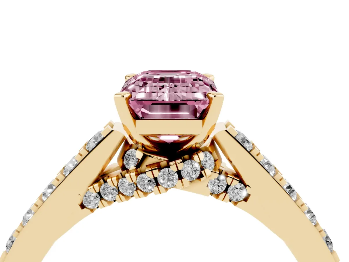 Fancy Pink Emerald Cut Diamond Solitaire Ring with Crossover Gallery and Round Pavé Band Yellow gold