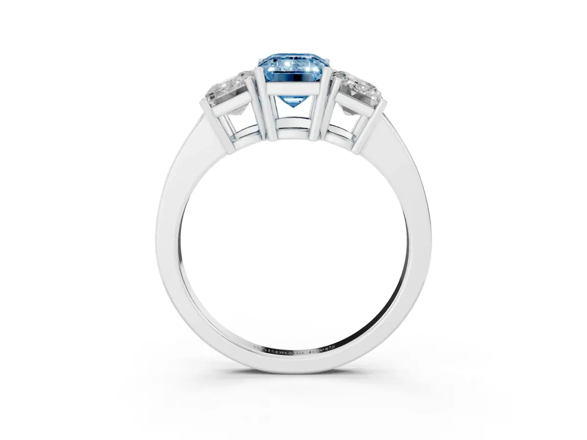 Fancy Blue Three-Stone Emerald Cut Cut Diamond Engagement Ring with Flat Band and Four-Prong Setting Platinum