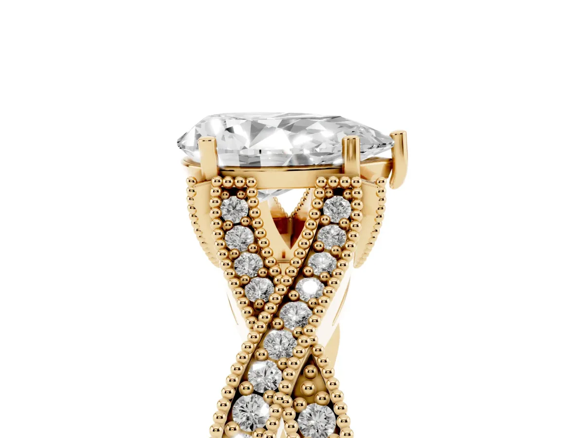 Pear Cut Cut Diamond Twisted Band with Milgrain Pave Setting and Four-Prong Setting Yellow gold