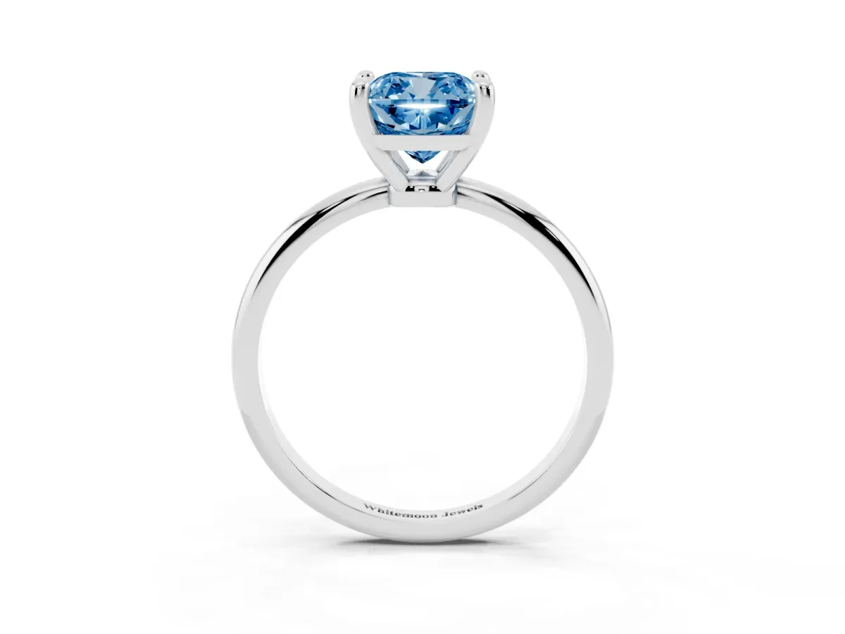 Fancy Blue Cushion Cut Solitaire Diamond Ring with 4-Prong Setting on a Classic Band Silver