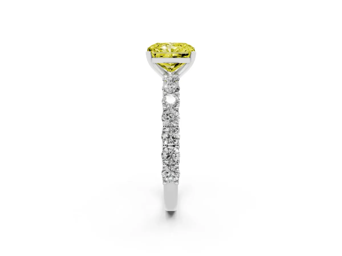 Fancy Yellow Radiant Cut Diamond Solitaire Ring with Shared Prong Pavé Band and Four-Prong Setting Platinum