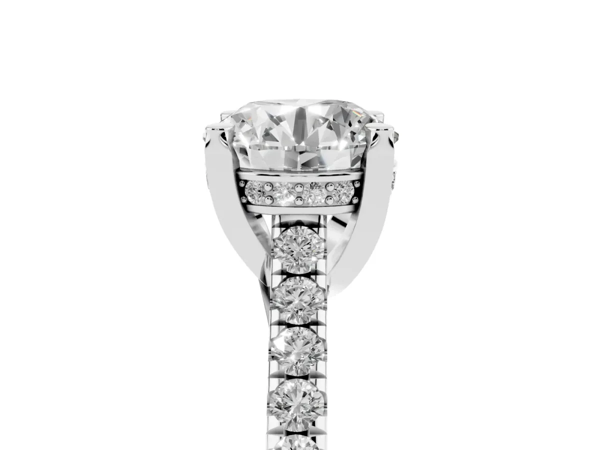 Round Cut Brilliant Diamond Solitaire with Pavé Band and Four-Prong Setting Silver