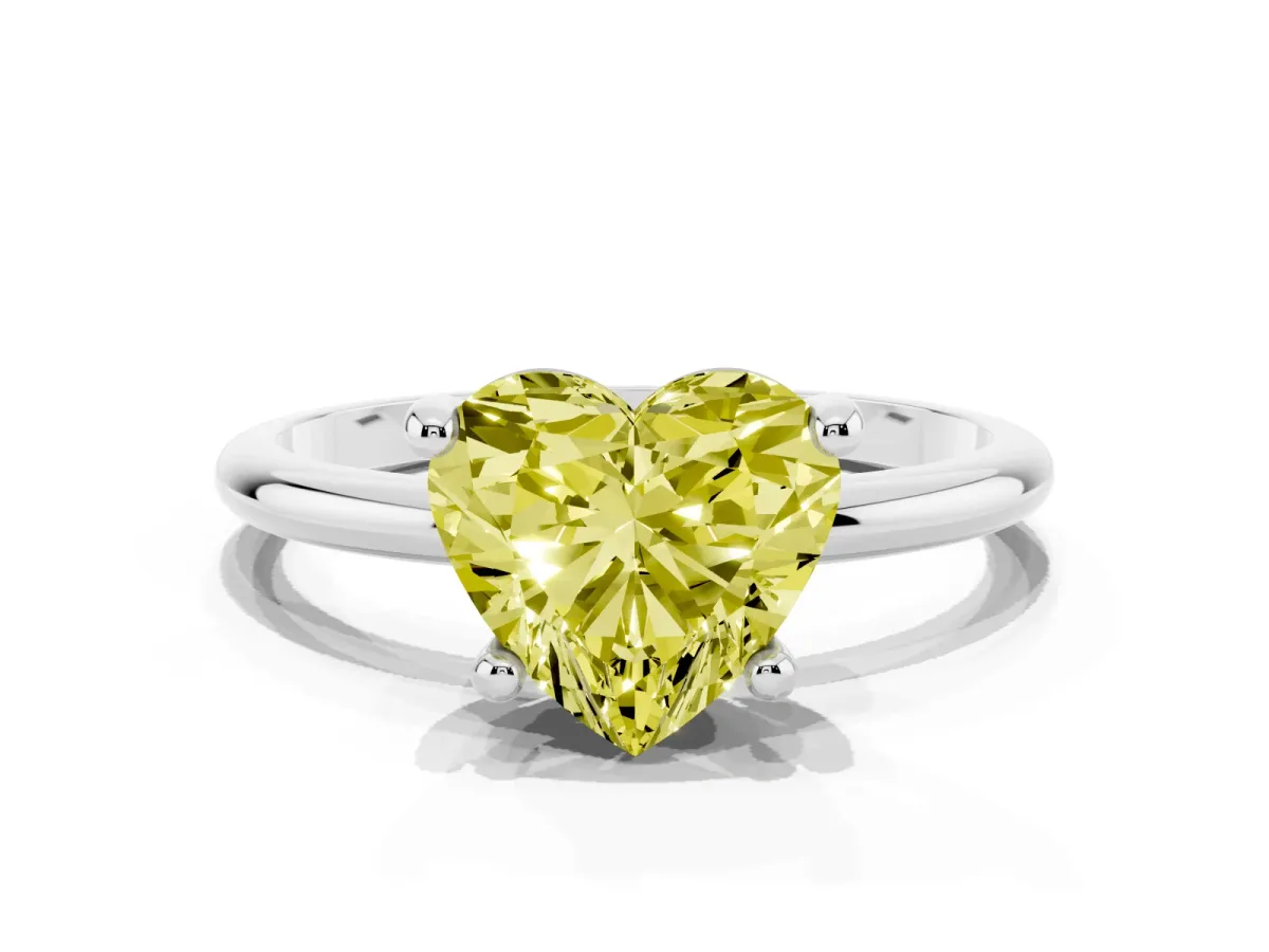 Fancy Yellow Heart Cut Solitaire Diamond Ring with 4-Prong Setting on a Classic Band Silver