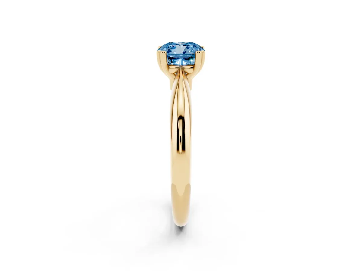 Fancy Blue Cushion Cut Cut Solitaire Engagement Ring with Tapered Band and Four-Prong Setting Yellow gold