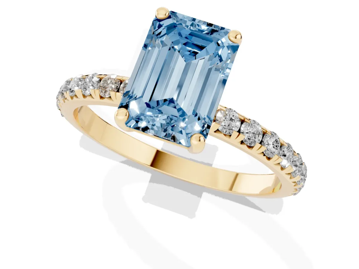 Fancy Blue Emerald Cut Cut Diamond Solitaire Ring with Micro Pave Band and Four Prong Setting Yellow gold