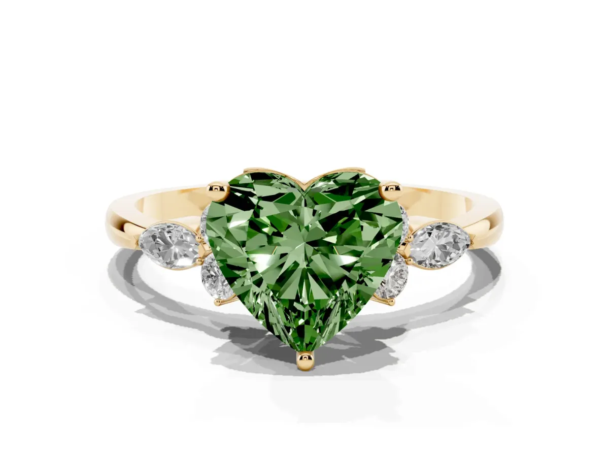 Fancy Green Heart Cut Brilliant Diamond Solitaire Ring with Pear Side Stones and Four-Prong Setting Yellow gold