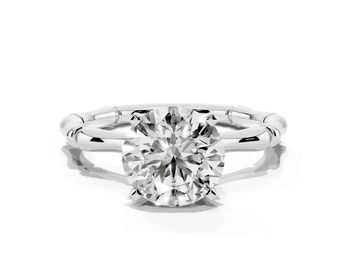 Round Cut Solitaire Diamond Ring with Bamboo Band and Four-Prong Setting Silver