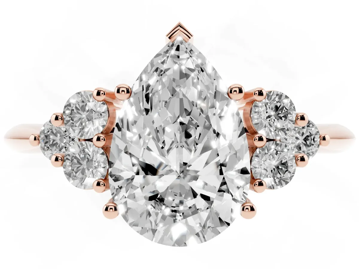 Pear Cut Cut Diamond Cluster Ring with Solitaire Band and Four-Prong Setting Rose gold