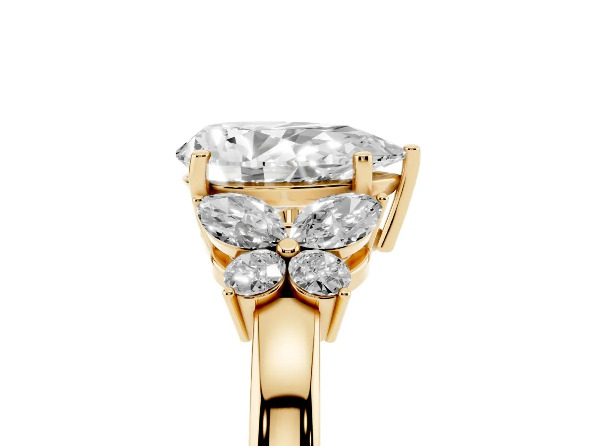 Pear Cut Cut Solitaire Floral Diamond Ring with Four-Prong Setting Yellow gold