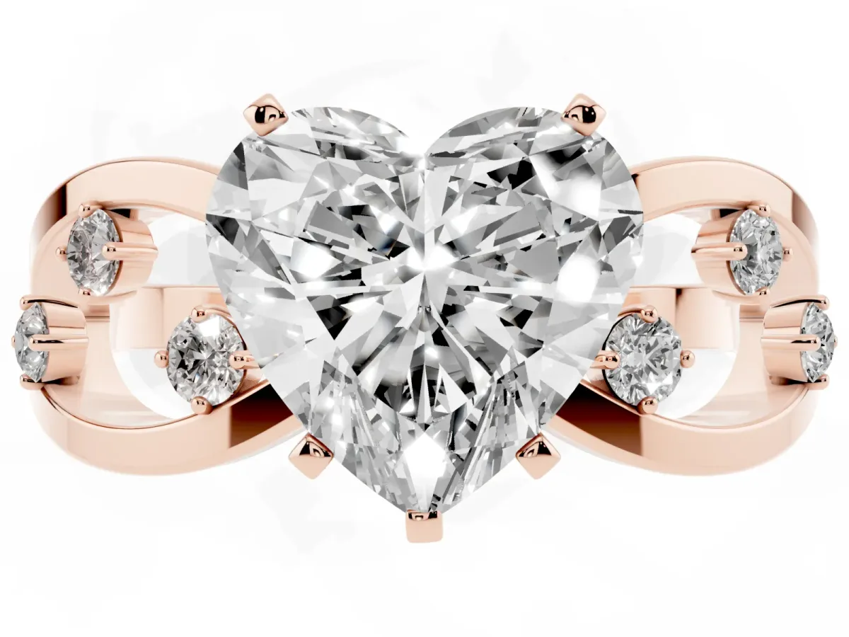 Heart Cut Cut Solitaire Diamond with Side Stones on Criss-Cross Band and Four-Prong Setting Rose gold