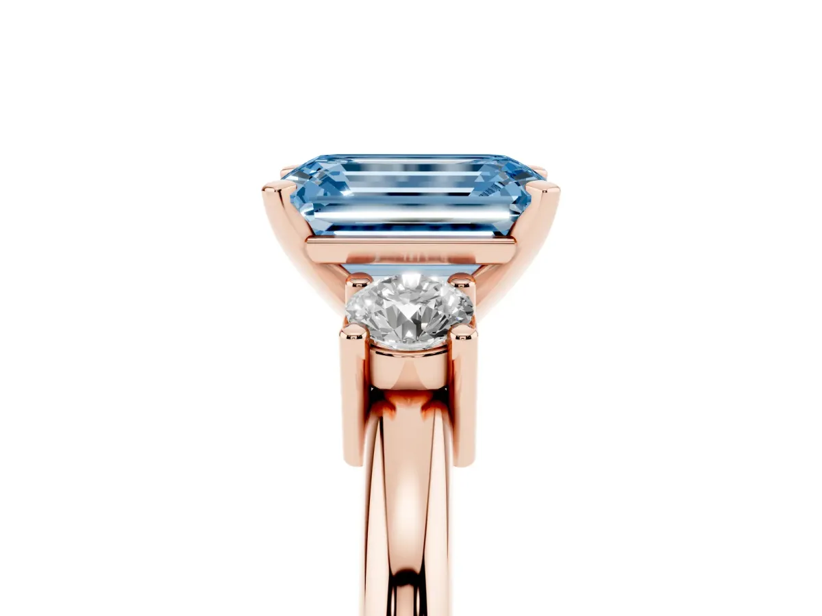 Fancy Blue Three-Stone Emerald Cut Cut Diamond Solitaire with Prong Setting and Classic Band Rose gold