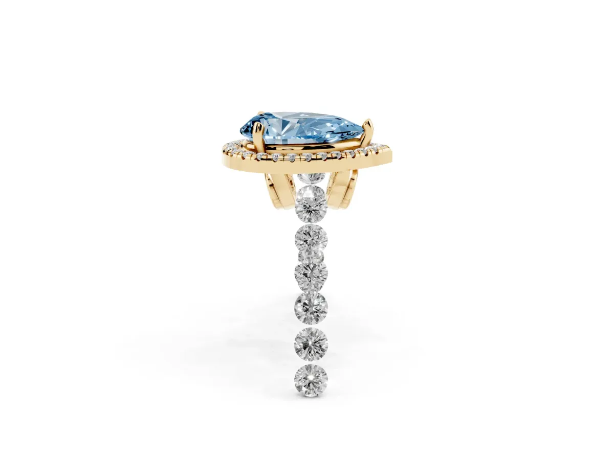 Fancy Blue Pear Cut Halo Pavé Diamond Engagement Ring with Four-Prong Setting Yellow gold