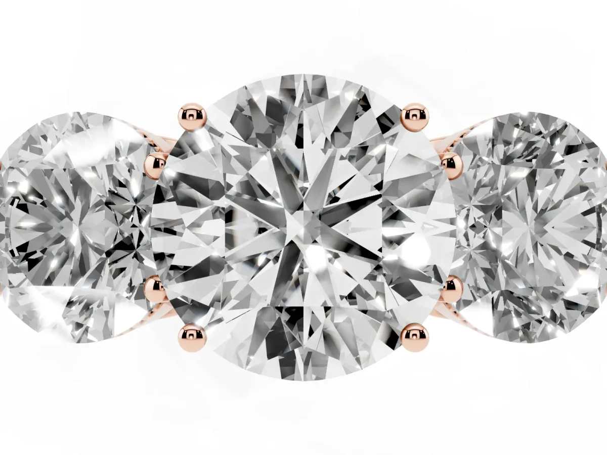 Three-Stone Round Cut Diamond Engagement Ring with Prong Setting on a Classic Band Rose gold