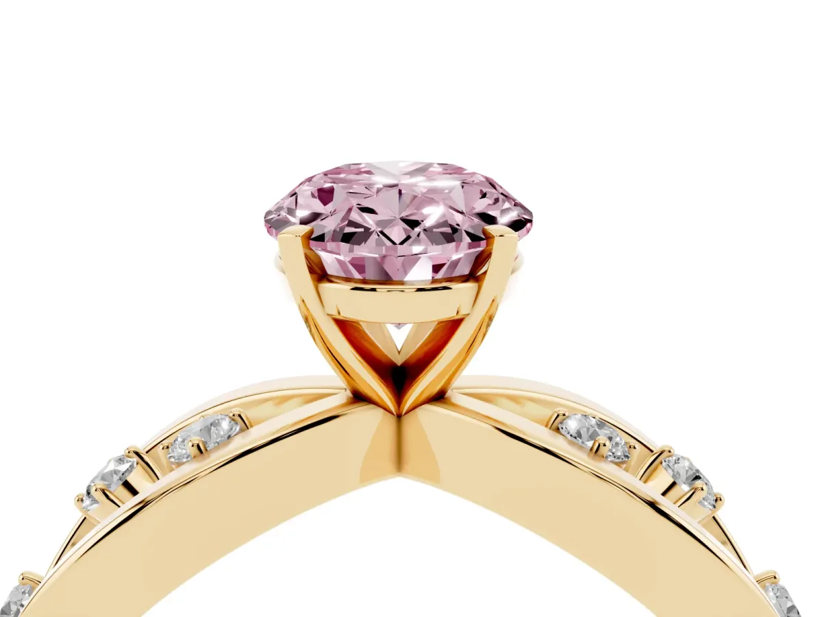 Fancy Pink Oval Cut Cut Solitaire Diamond with Side Stones on Criss-Cross Band and Four-Prong Setting Yellow gold