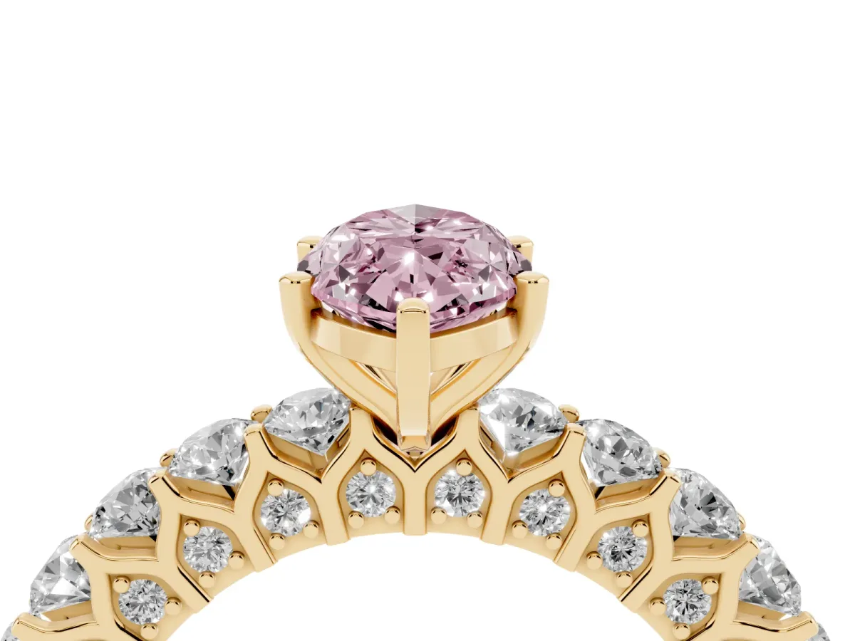 Fancy Pink Marquise Cut Diamond Solitaire Ring with Shared Prong Pavé Band and Four-Prong Setting Yellow gold