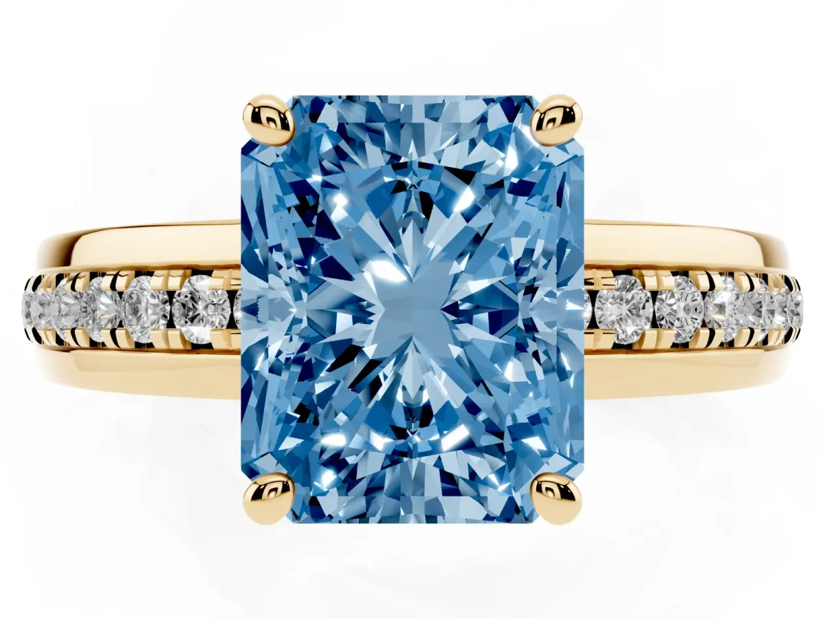 Fancy Blue Radiant Cut Solitaire Diamond Ring with Channel Set Band and Six-Prong Setting Yellow gold