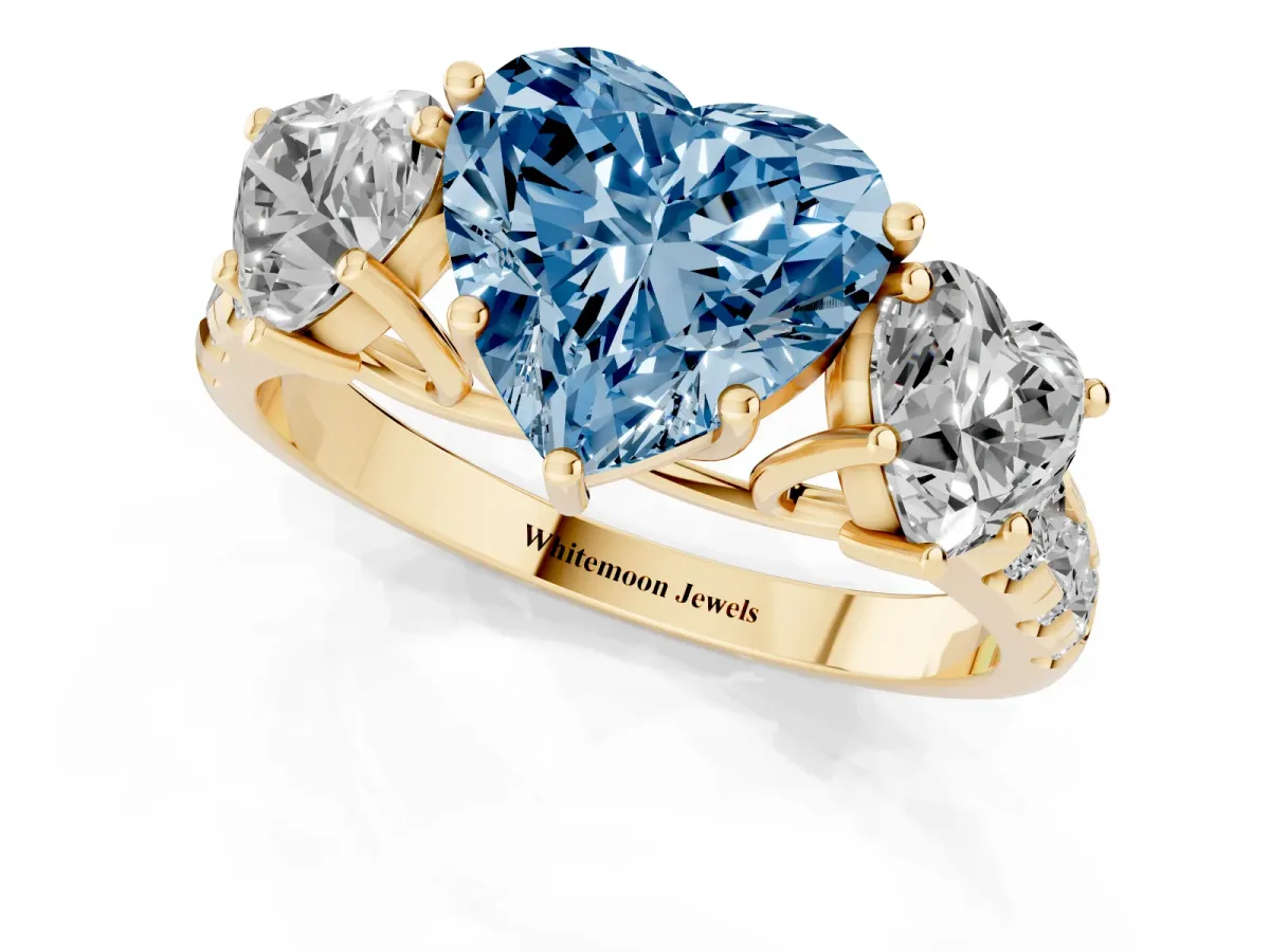 Fancy Blue Three-Stone Heart Cut Diamond Pavé Band with Prong Setting Yellow gold