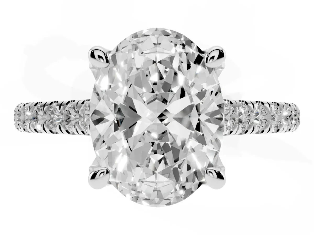 Oval Cut Brilliant Diamond Solitaire with Pavé Band and Four-Prong Setting Silver