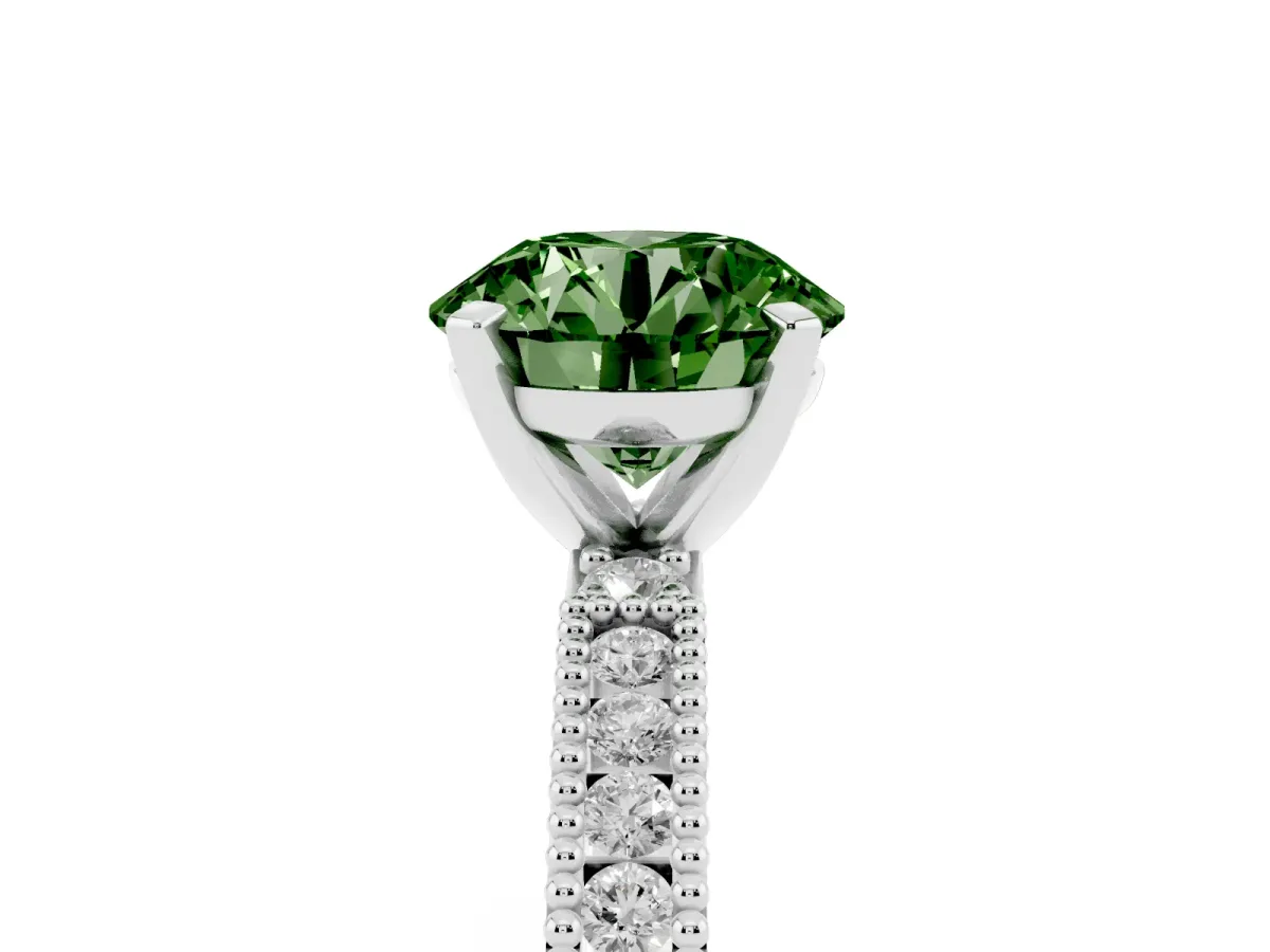 Fancy Green Round Cut Solitaire with Pavé Band and Four-Prong Setting Silver