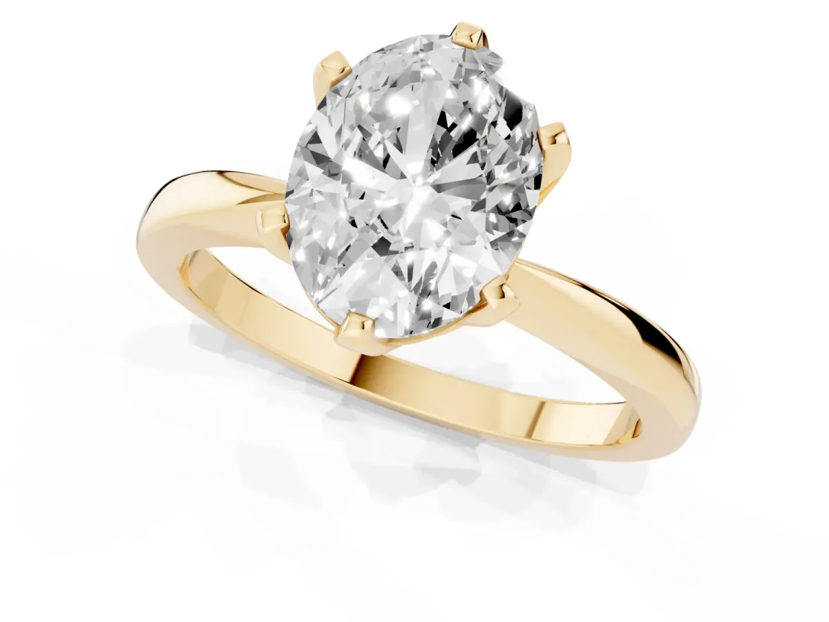 Oval Cut Solitaire Engagement Ring with Six-Prong Setting and Tapered Band Yellow gold