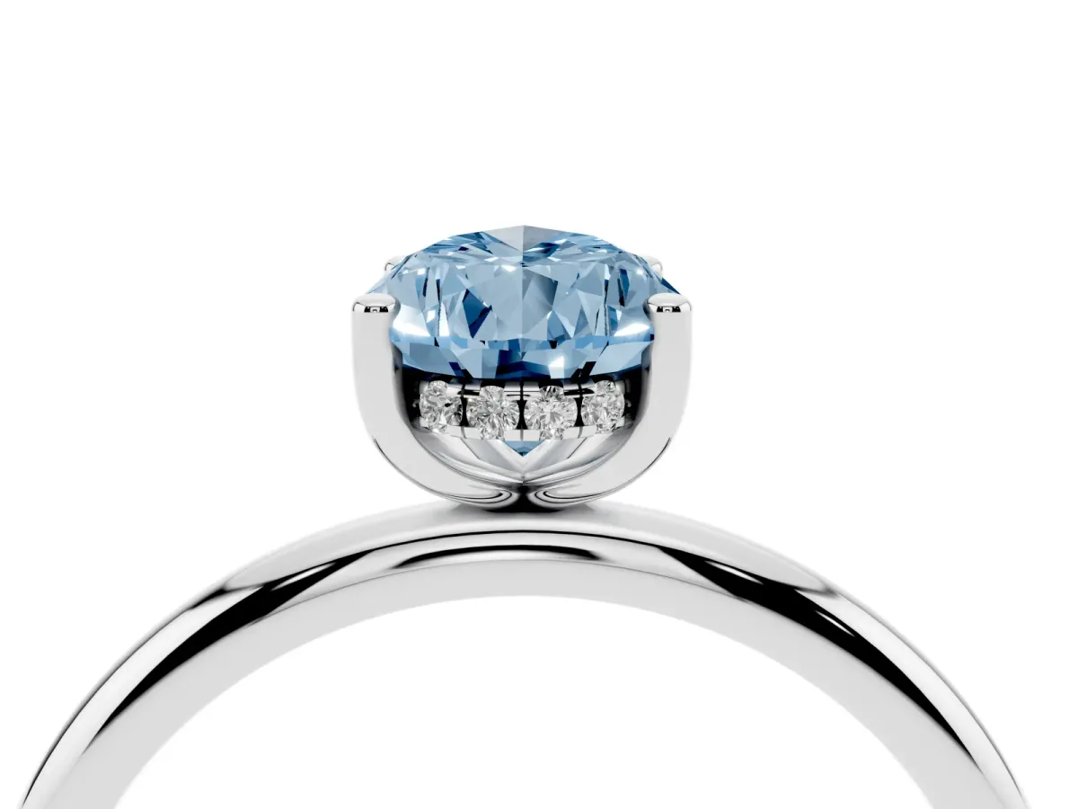 Fancy Blue Pear Cut Cut Solitaire Engagement Ring with Four-Prong Setting and Classic Band Silver