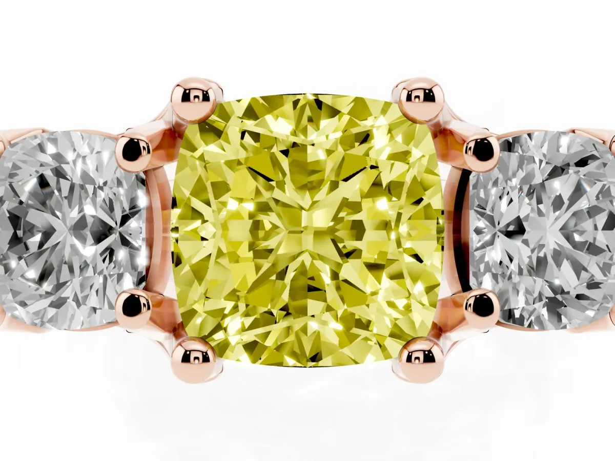 Fancy Yellow Cushion Cut Diamond Three-Stone Ring with Channel Set Band and Four-Prong Setting Rose gold