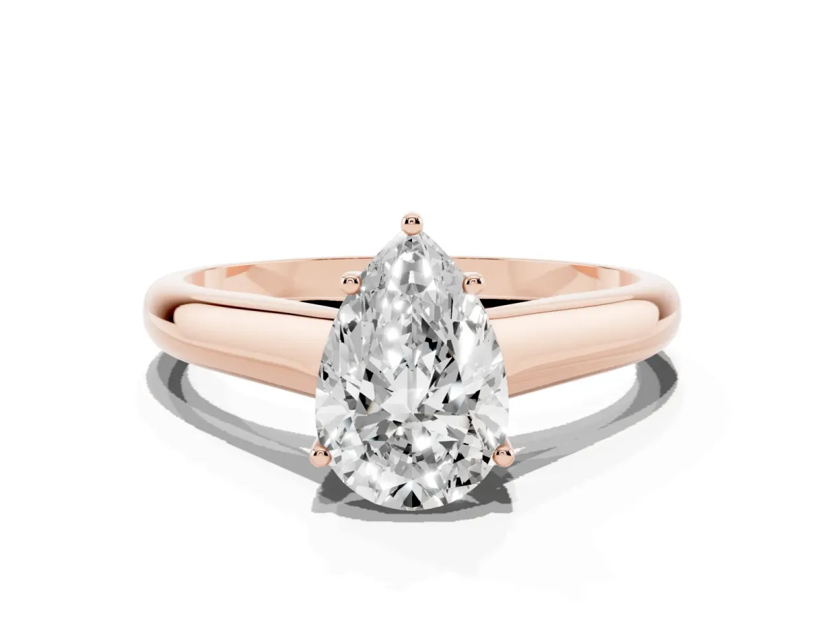 Pear Cut Solitaire Engagement Ring with Tapered Band and Four-Prong Setting Rose gold