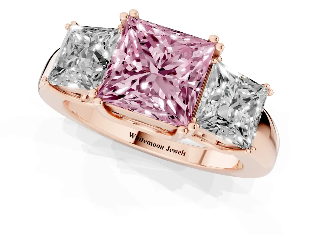 Fancy Pink Three-Stone Princess Cut Cut Diamond Ring with Channel Set Band and Four-Prong Setting Rose gold