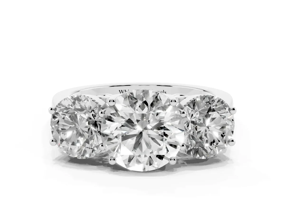 Three-Stone Round Cut Diamond Engagement Ring with Prong Setting on a Classic Band Silver