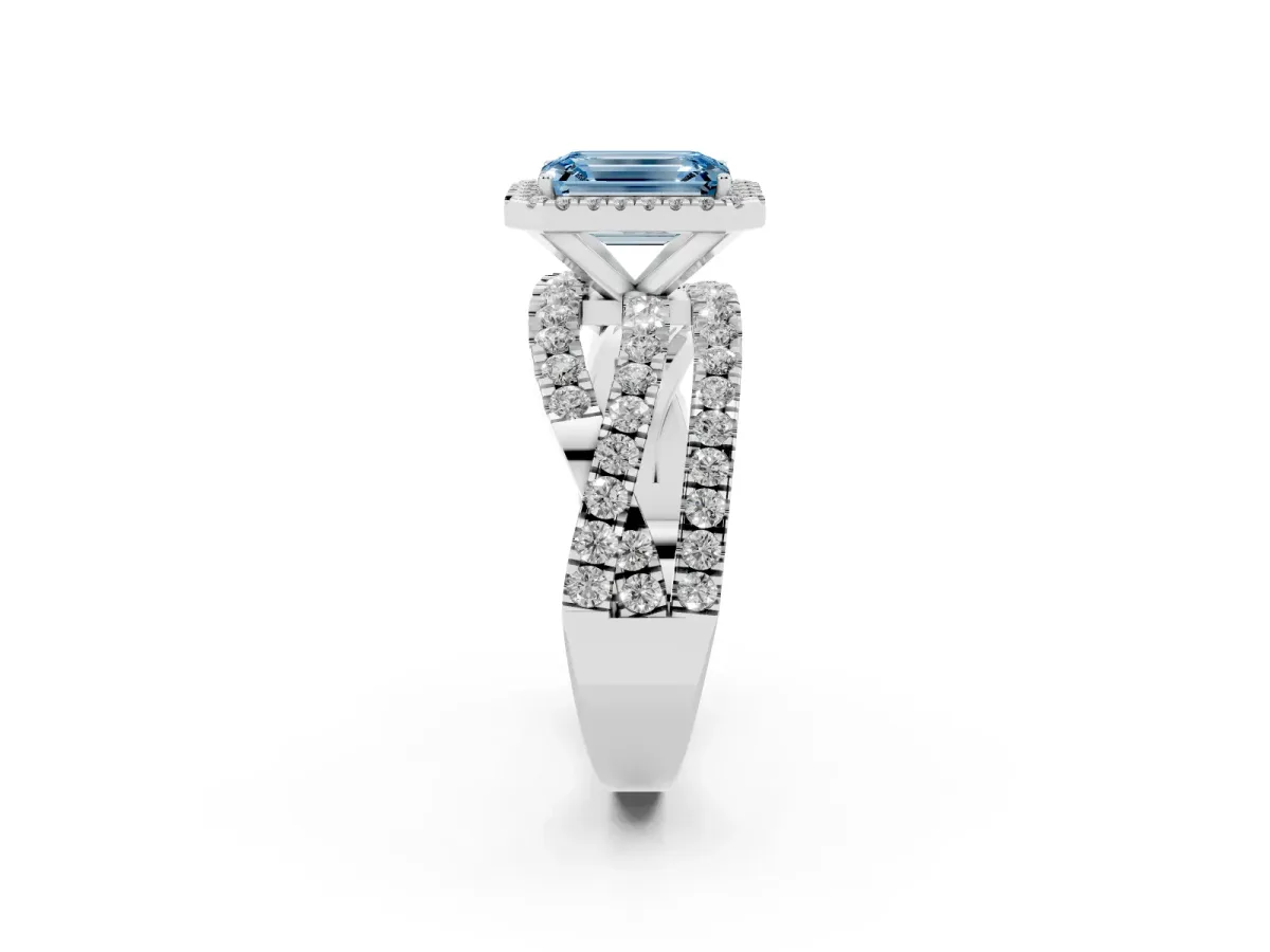 Fancy Blue Emerald Cut Diamond Halo Ring with Round Split Shank and Prong Setting Platinum