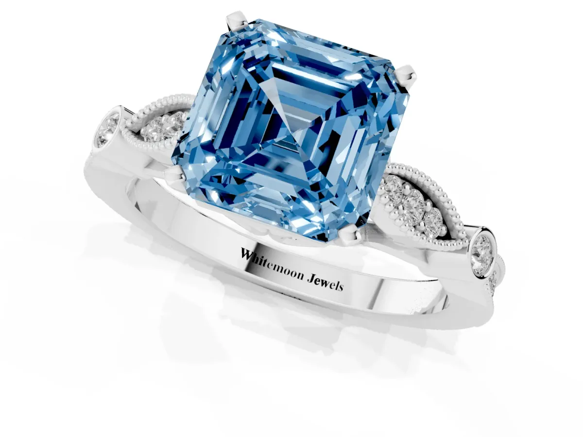 Fancy Blue Asscher Cut Cut Diamond with Milgrain Marquise and Bezel Accents on a Solitaire Band with Prong Setting Silver