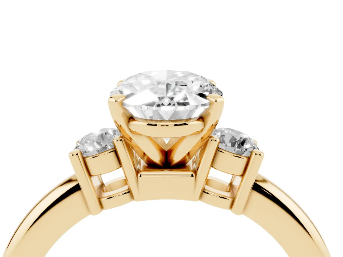 Three-Stone Oval Cut Cut Diamond Solitaire with Prong Setting and Classic Band Yellow gold