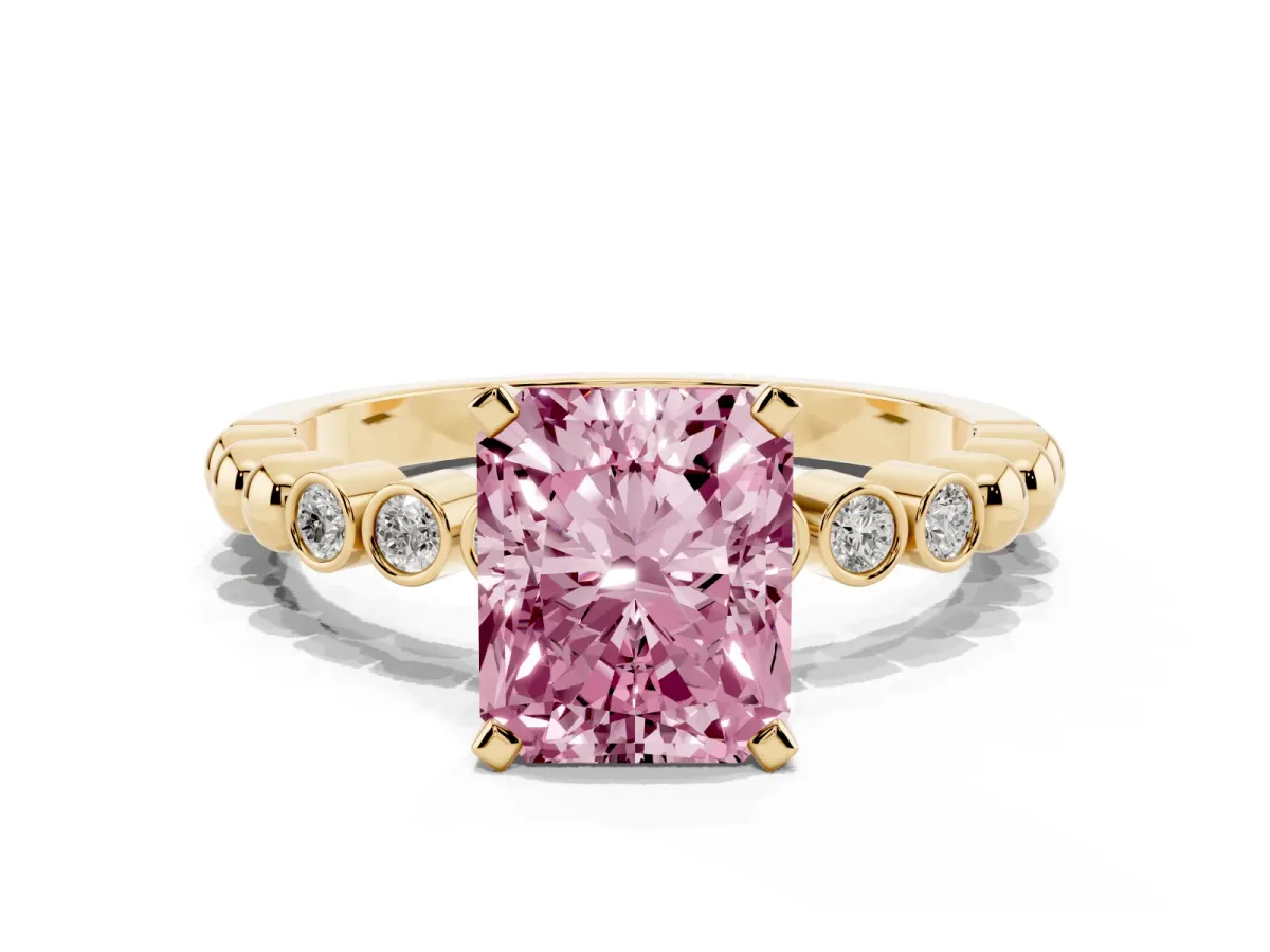 Fancy Pink Radiant Cut Solitaire Bezel Accent Diamond Engagement Ring with Beaded Band and Four-Prong Setting Yellow gold