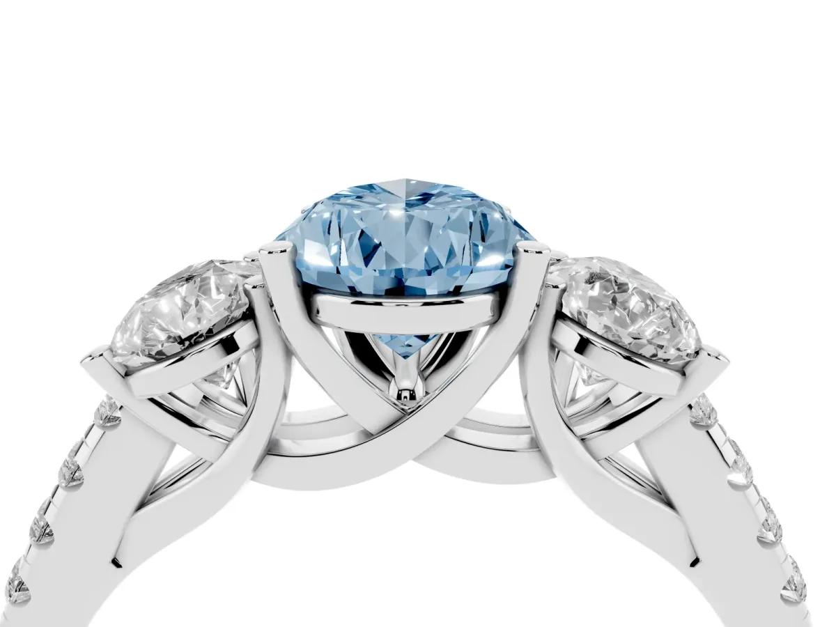 Fancy Blue Three-Stone Pear Cut Diamond Ring with Round Pavé Band and Prong Setting Silver