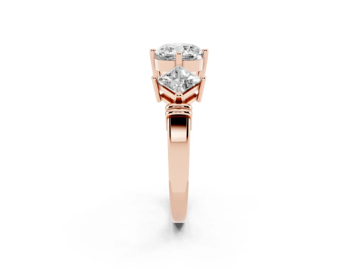 Three-Stone Cushion Cut and Princess Cut Diamond Ring with Channel Band and Four-Prong Setting Rose gold