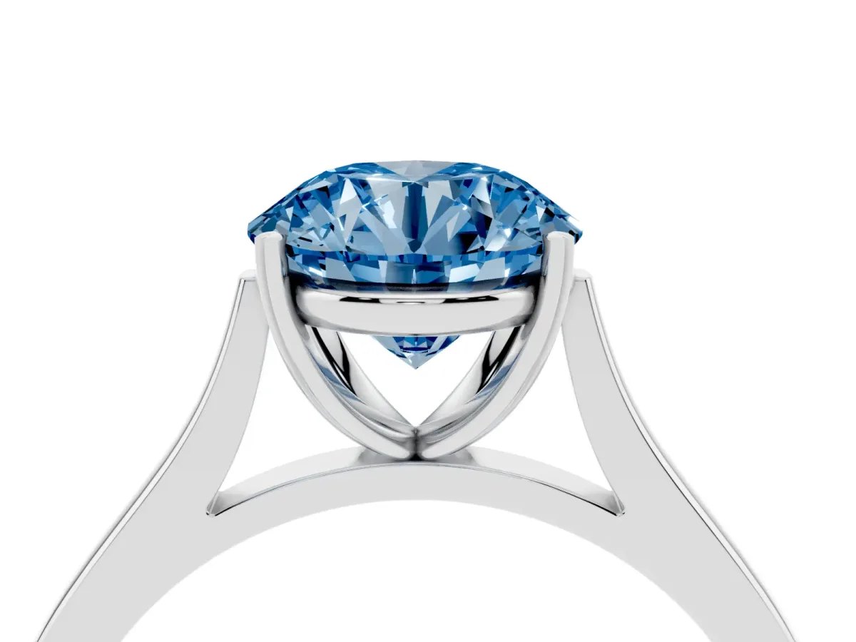 Fancy Blue Round Cut Solitaire Heart Prong Engagement Ring with Tapered Band Silver
