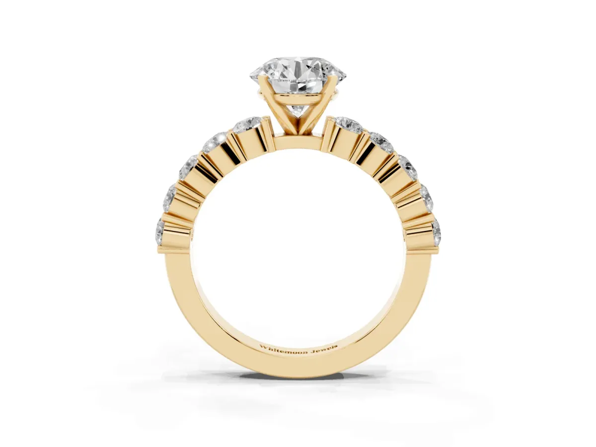 Round Cut Diamond Solitaire Ring with Shared Prong Round Side Stones Yellow gold