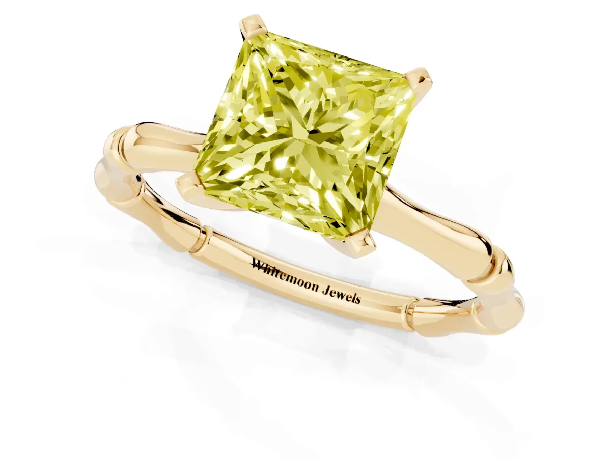 Fancy Yellow Princess Cut Solitaire Diamond Ring with Bamboo Band and Four-Prong Setting Yellow gold