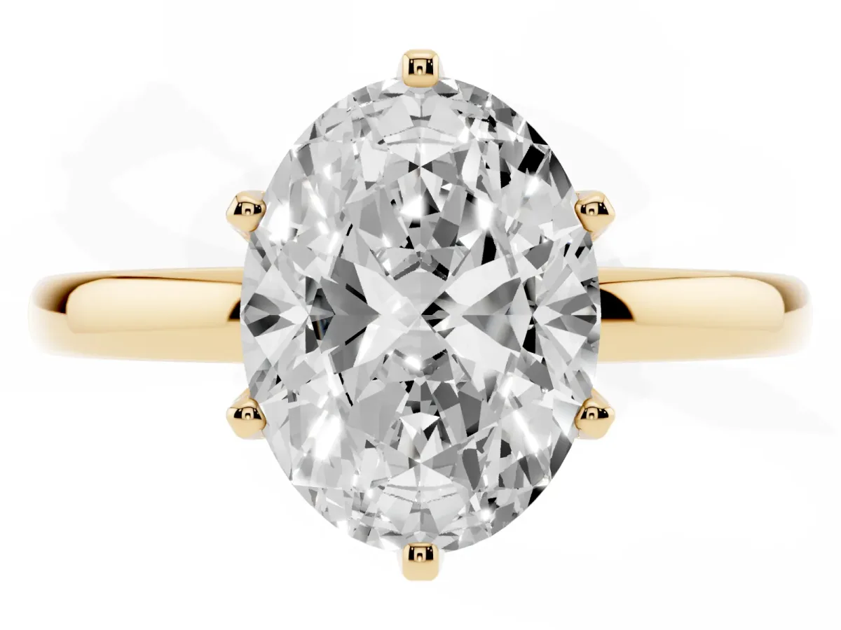 Oval Cut Solitaire Diamond Ring with Six-Prong Setting on a Classic Band Yellow gold