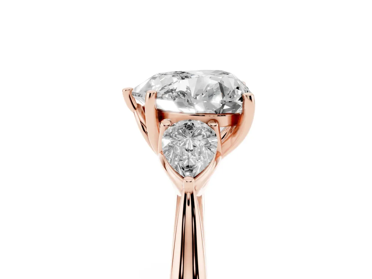 Three-Stone Heart Cut Brilliant Diamond Solitaire Ring with Tapered Band and Four-Prong Setting Rose gold