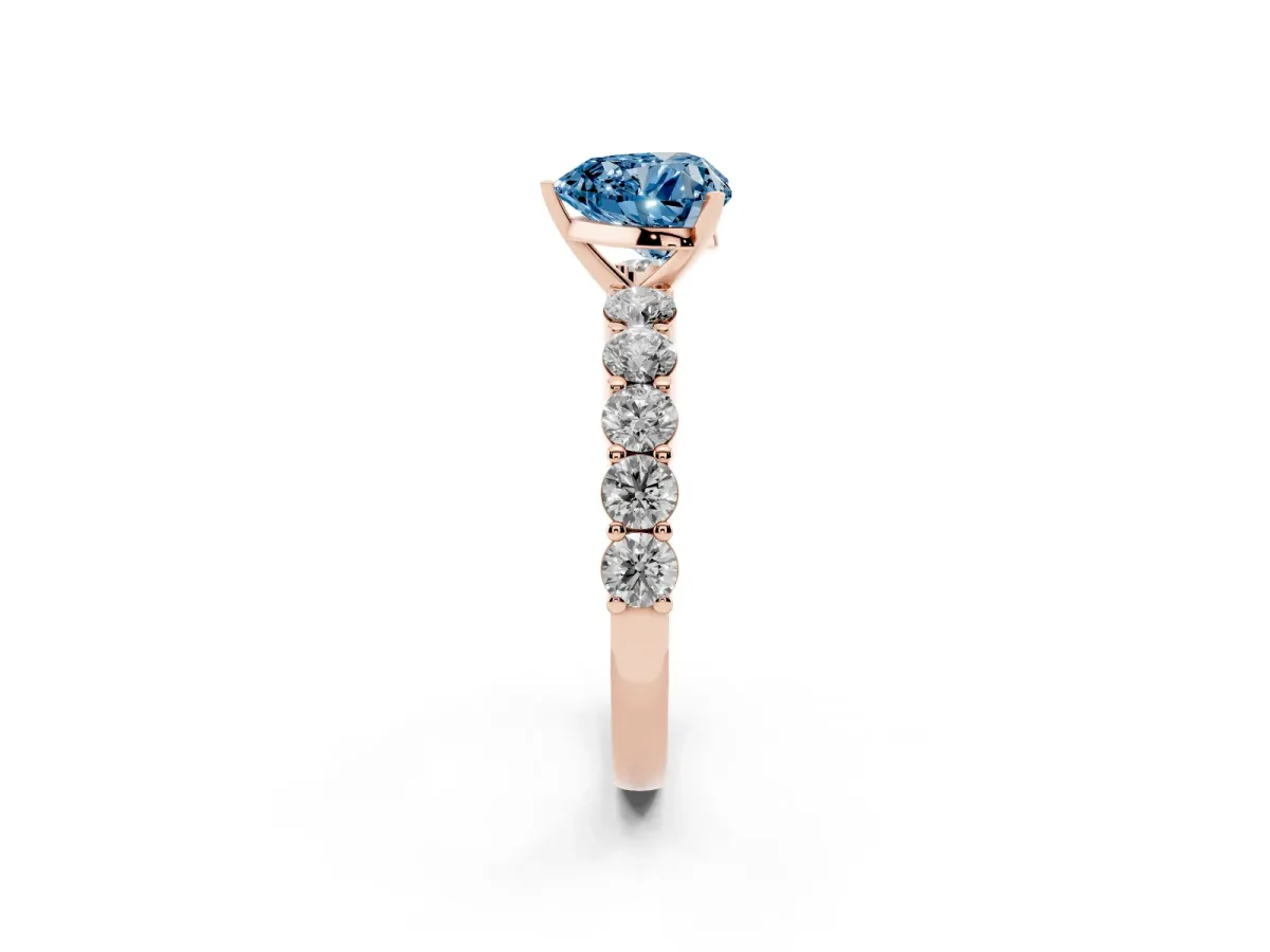 Fancy Blue Heart Cut Diamond Solitaire Ring with Shared Prong Round Side Stones Rose gold