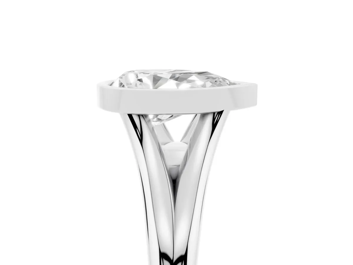Bezel Set Pear Cut Cut Solitaire Ring with Tapered Band Platinum